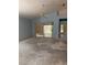Vacant light blue living room with a ceiling fan and sliding door at 13543 Emeraldview Dr, Orlando, FL 32828