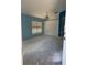 Vacant room with large window and outdated light fixture at 13543 Emeraldview Dr, Orlando, FL 32828