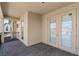 A large balcony shows brick floors and double doors at 14138 Alafaya Oak Bnd, Orlando, FL 32828