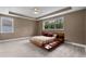 Tranquil bedroom with contemporary bed, recessed lighting, and serene views at 14138 Alafaya Oak Bnd, Orlando, FL 32828