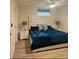 Cozy bedroom with a plush bed, matching nightstands, and soft, inviting decor at 1832 Katz Crossing Dr, Kissimmee, FL 34744