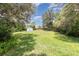 Spacious backyard featuring shed and lawn at 196 Morning Glory Dr, Lake Mary, FL 32746