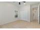 This bedroom offers neutral paint, tile floors and a double door closet at 196 Morning Glory Dr, Lake Mary, FL 32746