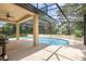 The screened-in pool area features a custom pool, BBQ, and outdoor patio seating at 196 Morning Glory Dr, Lake Mary, FL 32746