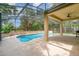 Covered lanai overlooking the pool and landscaped backyard at 196 Morning Glory Dr, Lake Mary, FL 32746