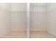 Spacious walk-in closet with built-in shelving for optimal organization and storage at 196 Morning Glory Dr, Lake Mary, FL 32746