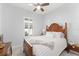 Bedroom with natural light, a ceiling fan, and a wooden sleigh bed at 2301 Datura Loop, St Cloud, FL 34772
