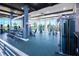 Well-equipped gym featuring weight machines, free weights, and mirrored walls for a complete workout at 2301 Datura Loop, St Cloud, FL 34772