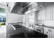 Gourmet kitchen features stainless appliances, granite countertops, and modern finishes at 2301 Datura Loop, St Cloud, FL 34772