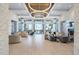 Stunning lobby area boasts luxurious seating, high ceilings, and lots of natural light at 2301 Datura Loop, St Cloud, FL 34772