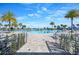 Large community pool with crystal blue waters and poolside seating at 2301 Datura Loop, St Cloud, FL 34772