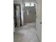 Renovated bathroom features a walk-in shower with marble tiling and neutral-colored flooring at 233 Red Maple Dr, Kissimmee, FL 34743