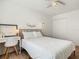 Comfortable bedroom with desk, closet, and a cozy bed for a restful night's sleep at 2384 Andrews Valley Dr, Kissimmee, FL 34758
