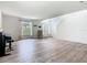 Open living space showcasing high ceilings, natural light, and hardwood flooring at 2384 Andrews Valley Dr, Kissimmee, FL 34758