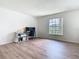 Functional office setup in a bright room with a large window, ready for productivity and focus at 2384 Andrews Valley Dr, Kissimmee, FL 34758