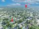 Aerial view of neighborhood near Dommerich Elementary & Maitland Middle, surrounded by trees and multiple lakes at 2450 Mcintosh Way, Maitland, FL 32751