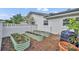 Backyard features raised garden beds, plants and compost, ideal for gardening enthusiasts at 2450 Mcintosh Way, Maitland, FL 32751