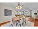 Cozy dining room seamlessly connects to the kitchen and living areas, perfect for entertaining at 2450 Mcintosh Way, Maitland, FL 32751