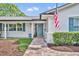 Close up of home featuring brick walkway leading to front door and manicured landscaping at 2450 Mcintosh Way, Maitland, FL 32751
