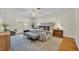 Serene main bedroom featuring neutral tones, plush bedding, and natural light from the windows at 2450 Mcintosh Way, Maitland, FL 32751
