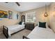Guest bedroom with two twin beds, neutral walls, and modern decor at 2801 Plaza Terrace Dr, Orlando, FL 32803