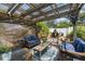 Outdoor dining area features seating and grill at 2801 Plaza Terrace Dr, Orlando, FL 32803