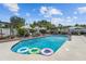 Inviting pool featuring lounge chairs, umbrellas, and colorful floats offers a perfect backyard oasis at 2801 Plaza Terrace Dr, Orlando, FL 32803