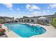 Backyard pool with lounge chairs, umbrellas, and poolside seating, perfect for relaxation and entertaining at 2801 Plaza Terrace Dr, Orlando, FL 32803