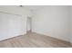 Bright bedroom with a spacious closet and luxury vinyl plank flooring at 3072 Sw 168Th Loop, Ocala, FL 34473