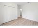 Bright bedroom with a spacious closet and luxury vinyl plank flooring at 3072 Sw 168Th Loop, Ocala, FL 34473