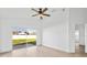 Spacious bedroom with lots of light from sliding glass doors leading to the backyard at 3078 Mandolin Dr, Kissimmee, FL 34744