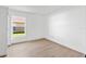 Bright bedroom offers hardwood floors, natural light, and a spacious closet at 3078 Mandolin Dr, Kissimmee, FL 34744