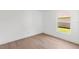 Bright bedroom offers hardwood floors and a window bringing in natural light at 3078 Mandolin Dr, Kissimmee, FL 34744