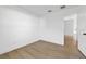 Bright bedroom with hardwood floors, natural light, and a spacious closet at 3078 Mandolin Dr, Kissimmee, FL 34744