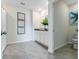 Bathroom featuring tile flooring, white cabinetry, and a shower with curtain at 3429 Briarwood Grove, Ocoee, FL 34761