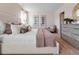 Serene bedroom with soft lighting, and refined decor at 3429 Briarwood Grove, Ocoee, FL 34761