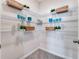 Walk-in pantry with wire shelving offers storage for groceries at 3429 Briarwood Grove, Ocoee, FL 34761