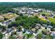 An aerial view shows the home's location near community recreational fields and buildings at 347 Timberwood Trl, Oviedo, FL 32765
