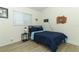 Modern bedroom with dark blue bedding, themed decor, and a relaxed, comfortable vibe at 347 Timberwood Trl, Oviedo, FL 32765