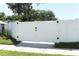 A white privacy fence surrounds this property, creating a secluded backyard at 347 Timberwood Trl, Oviedo, FL 32765