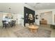 Bright open-concept with dining and living area with wood floors at 347 Timberwood Trl, Oviedo, FL 32765