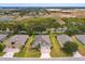 Aerial view of the home highlighting its location in a residential community with easy access to nearby fields at 3755 Sanibel St, Clermont, FL 34711