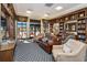 Community room featuring comfortable seating, bookshelves, and an inviting atmosphere for socializing and relaxation at 3755 Sanibel St, Clermont, FL 34711