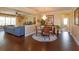 This dining room features hardwood floors, elegant chandelier and seamlessly connects to the living room at 3755 Sanibel St, Clermont, FL 34711