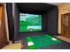 State-of-the-art golf simulator for practicing your swing, with high-tech graphics at 3755 Sanibel St, Clermont, FL 34711