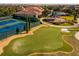 This aerial shot showcases the tennis and putting green near the community center at 3755 Sanibel St, Clermont, FL 34711