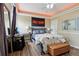 Cozy bedroom with a queen-size bed, modern furniture, and ambient lighting at 4001 Corrine Dr, Orlando, FL 32814