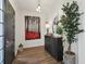 A beautifully decorated foyer with stylish furnishings, decorative lighting, and elegant hardwood floors at 4001 Corrine Dr, Orlando, FL 32814