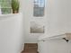 This hallway landing offers a window and artwork at 4001 Corrine Dr, Orlando, FL 32814
