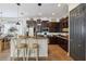 Beautiful kitchen featuring a granite countertop island, stainless steel appliances, and ample cabinet space at 4001 Corrine Dr, Orlando, FL 32814